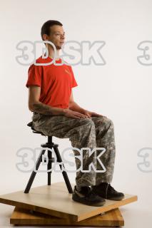 Sitting reference of whole body red shirt army jeans brown…